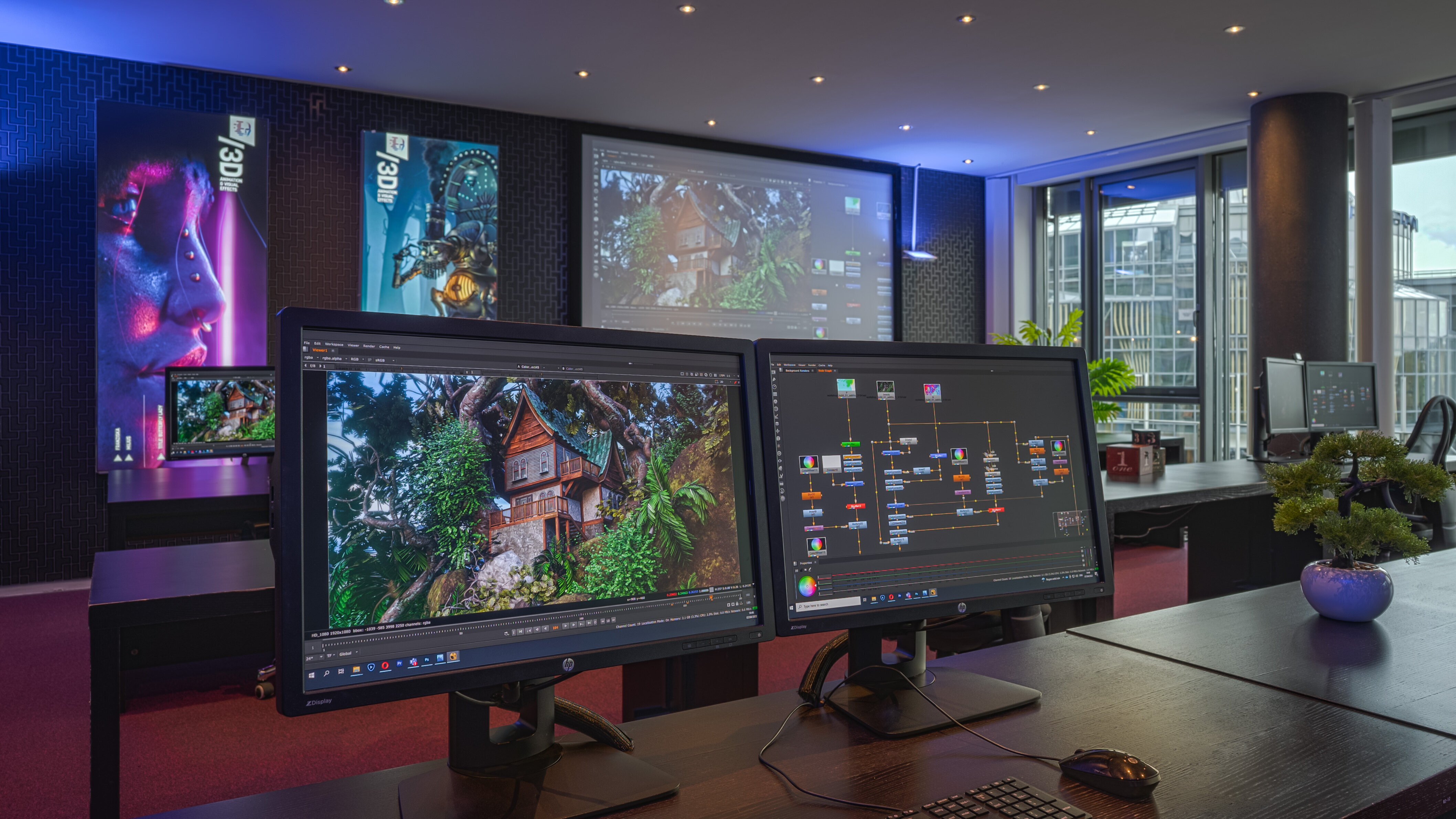 Two monitors display a compositing setup featuring a rendered 3D treehouse and a node graph in a modern training environment with projection screen, poster walls, and a city view through the windows.